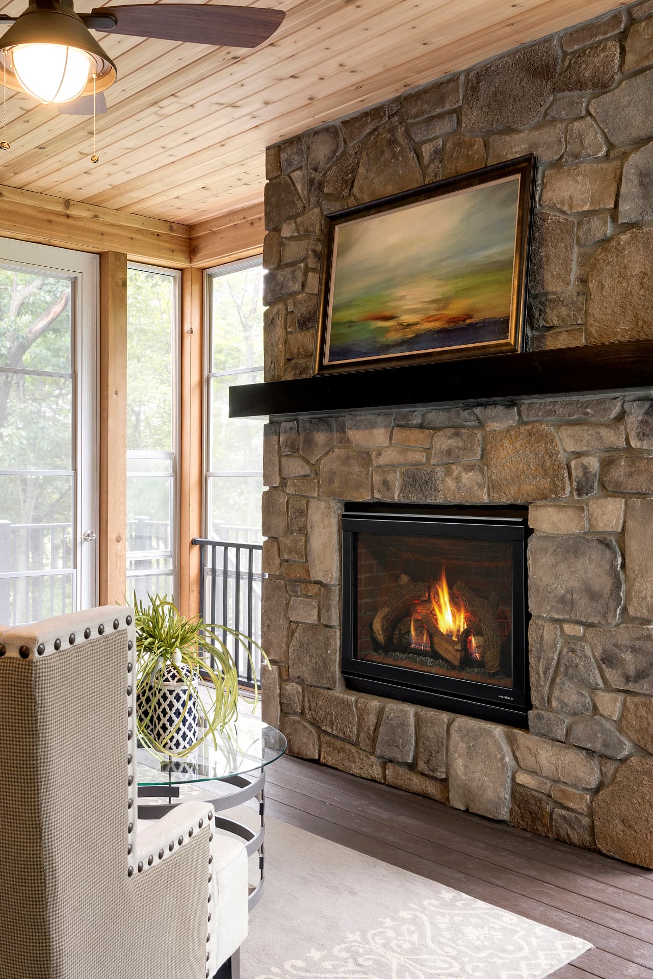 A gas fireplace by Heat & Glo installed in a living space.